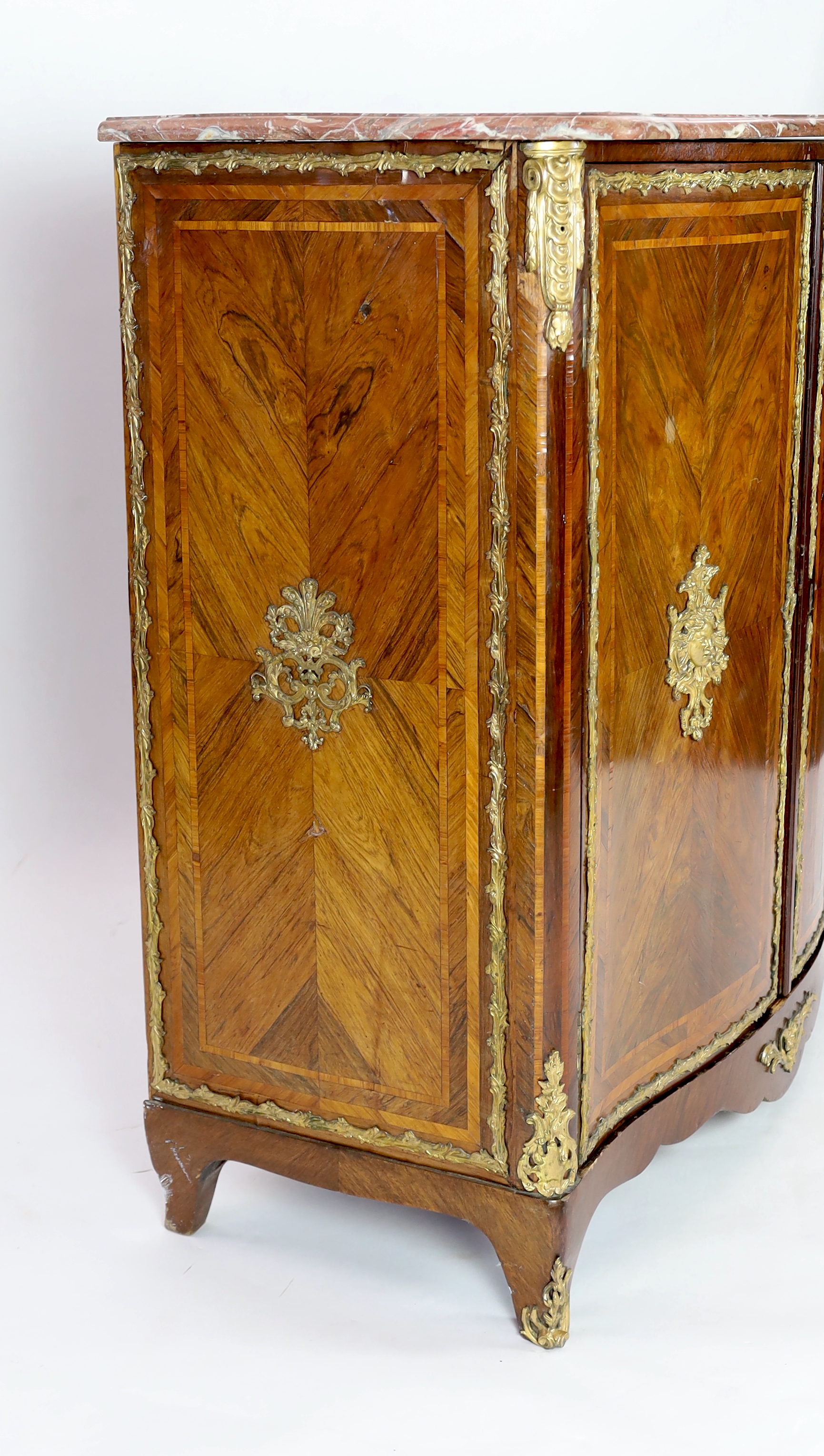 A Louis XV ormolu mounted rosewood and tulipwood Meuble d’Appui, 130cm wide, 63cm deep, 132cm high, Please note this lot attracts an additional import tax of 5% on the hammer price